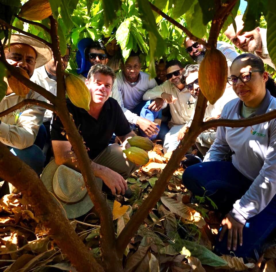 Peirot team gathering after first cacao pod harvest.